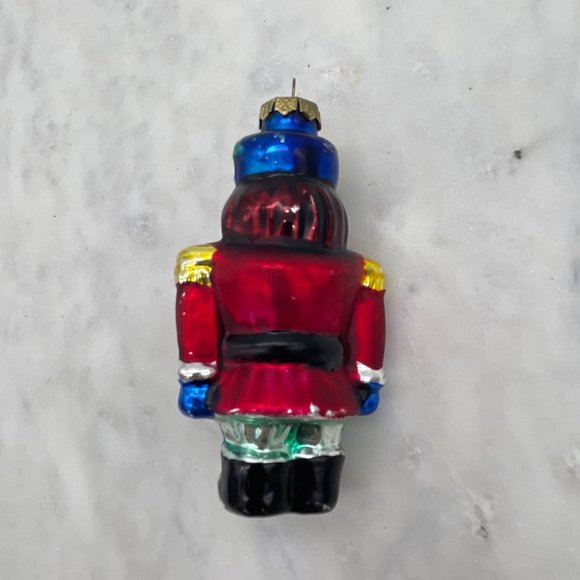 Blown Glass Nutcracker Ornament Christmas Soldier Red, Yellow, and Blue - Picture 5 of 8